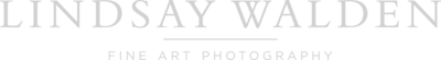Lindsay Walden Fine Art Photography logo featuring delicate lavender sprigs and elegant typography.