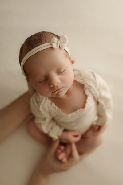 Book your newborn photography session in Jacksonville, FL, Fleming Island, FL, and Middleburg, FL for beautiful, high-quality images.