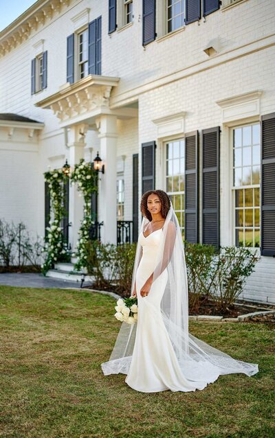 CLEAN AND CLASSIC SLIP WEDDING DRESS A universal look for the modern bride: the classic slip wedding dress is forever the head-turner, and Style 1319 from Martina Liana is no exception. A soft V-neckline, shoestring straps and an open back are clean and elegant–while the sheath silhouette of Moroccan silk is the epitome of effortless luxury. Molded bust cups offer the perfect amount of support while keeping the structure of the gown fluid and relaxed. A short train is all you need to complete this timeless design as you glide down the aisle and into forever.