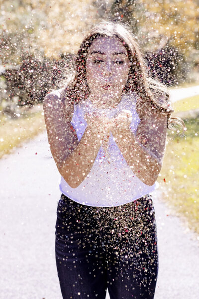 Alabama high school senior blows confetti