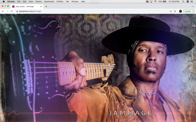 Musician branding website tour page design example Jeau James wearing black hat beige tassel suede jacket pointing guitar body past camera while standing in front of geometric patterned silver wall paper Package A