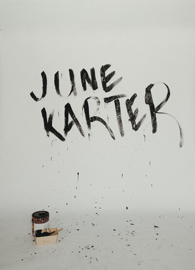 June Karter stylists hugging and laughing