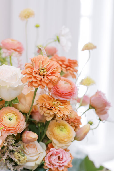 Bright, warm wedding flower bouquet photo taken by Austin wedding photographer