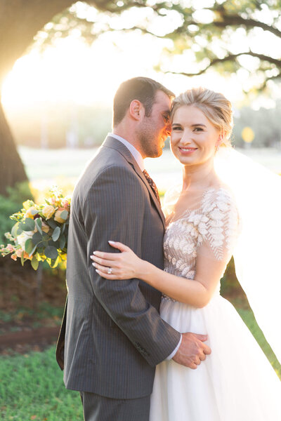Houston wedding couple smiles on their wedding day at Hotel Zaza  by Swish and Click Photograph