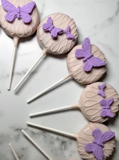 Beautiful butterfly-themed cakepops from Dip’d Desserts in Portland, Oregon, designed with intricate detail and luxury presentation, perfect for weddings, showers, and celebrations.