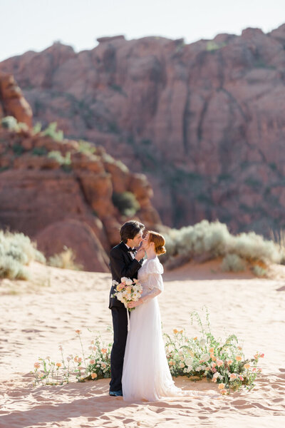 bride and groom kissing