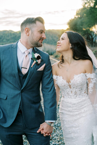 Golden hour wedding photography in Livermore with classic city skyline backdrop