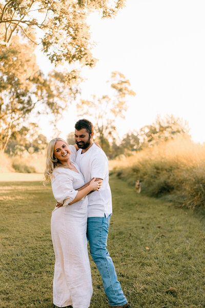 A cute moment between a newly engaged couple