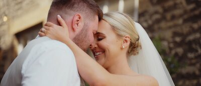 young couiple embracing at Holmes Mill Clitheroe shiot by Anthony Horseman Wedding Videographer and Photographer