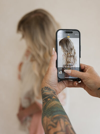 women with blond hair extensions and wavy curls