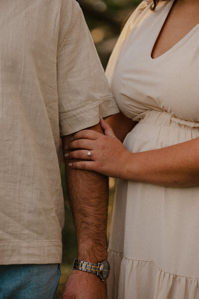 Romantic Omaha engagement session during the fall, captured by Tori Nichole Photography. The couple is surrounded by vibrant autumn foliage and golden light, creating warm, timeless moments. A perfect blend of natural beauty and authentic connection, showcasing the magic of the season and their love story.