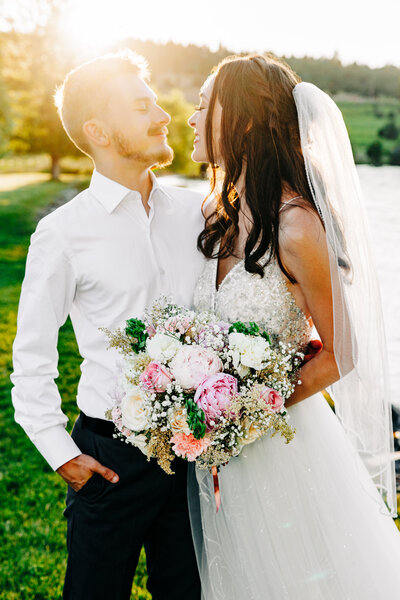 Golden hour portrait of bride and groom at Flathead Lake Forevers in Big Arm, MT
