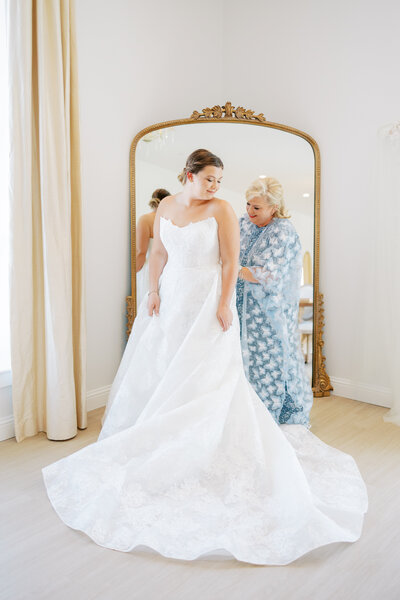 bride and mom getting ready in bridal suite at The Grand at Willow Springs in Northwest Arkansas