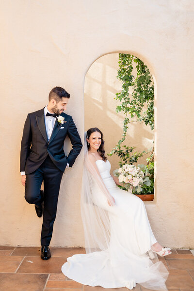 Bride and Groom standing together at their wedding at Rancho Bernardo Inn