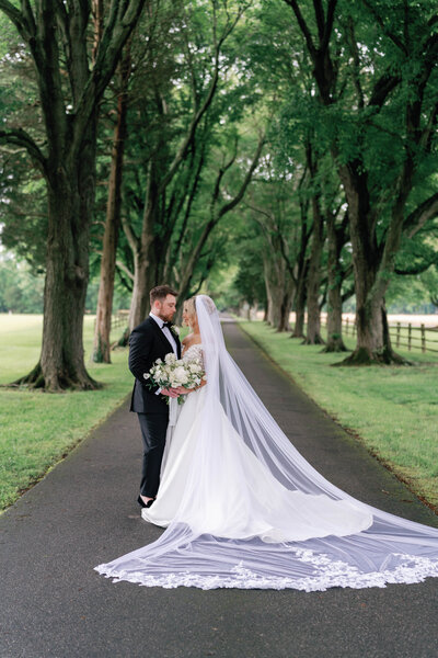 Bride and Groom portrait in the drive at Kirkland Manor