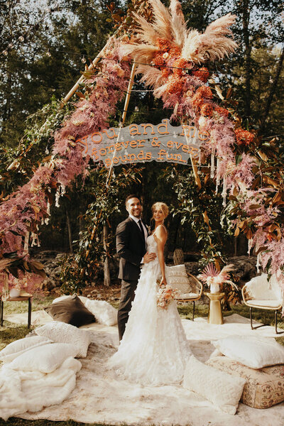 Tyler Rich and Sabina Gadecki wedding under pampas tee pee