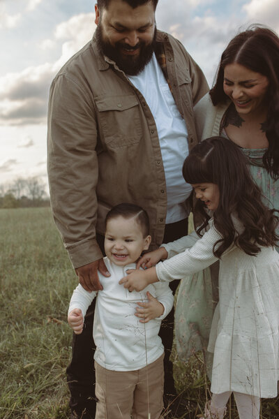 Family Photographer located in Columbia Tennessee offering in home, studio and outdoor sessions to best capture families.