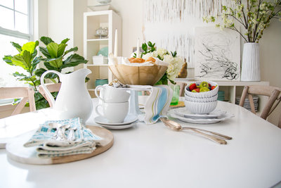 Tablescape on dining table in light and bright dining room