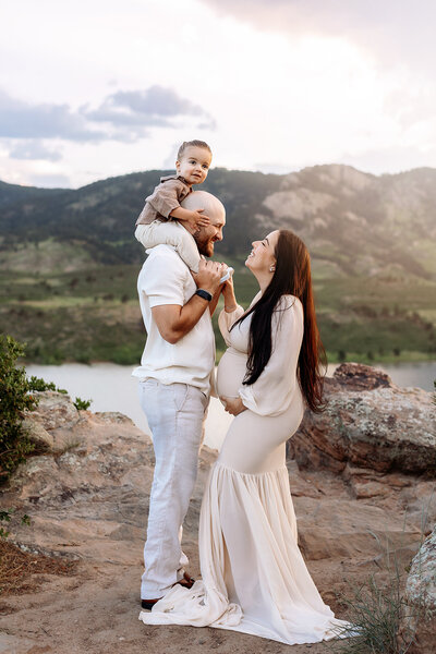 Sophisticated pregnancy photo session with Loveland mountain views.