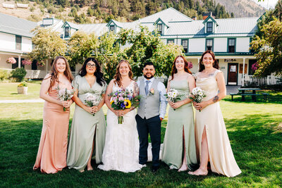 Portrait of bride and groom with bridesmaids at Chico Hot Springs in Pray, Montana