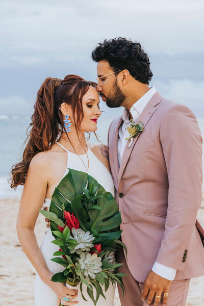 bride and groom on beach