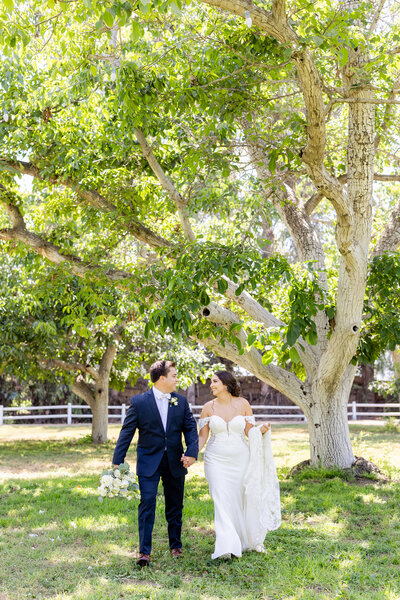 bride and groom photographed by preferred wedding photographer at walnut grove