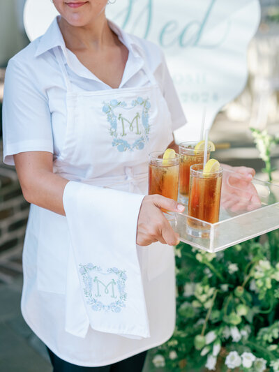 Wedding caterer serves iced tea