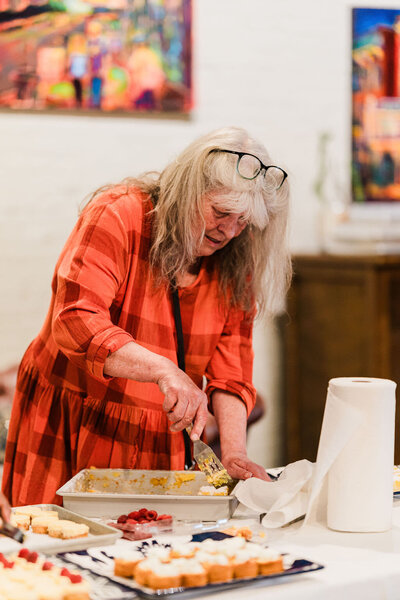 woman cutting cake