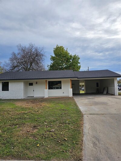 Home for sale in Krum Texas with inground pool and waterfall