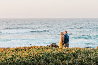 Sunset kiss along Scenic Drive in Pacific Grove