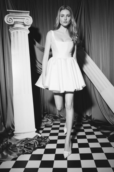 black and white image bride wearing off the shoulder textured wedding dress