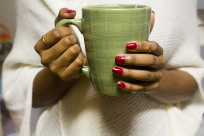 black-woman-holding-coffee