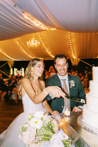 Bride and groom dancing on checkboard dance floor at Glen Foerd Estate in Philadelphia, PA