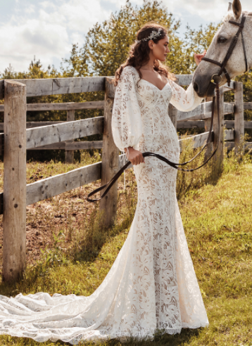 3D ivory lace Sheath silhouette Billowing detachable sleeves Plunging V-neckline Deep V back detail Cascading train