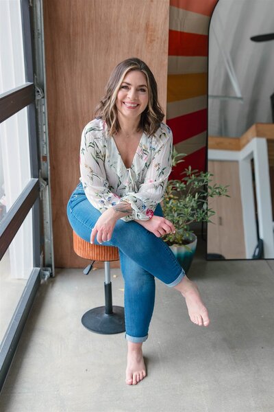 recovered woman sitting confidently