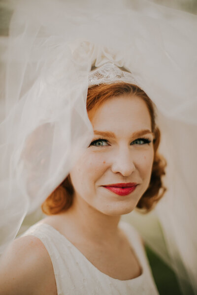A bride gazes at the camera