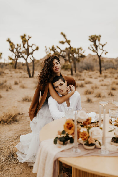 Bride and groom portrait in desert
