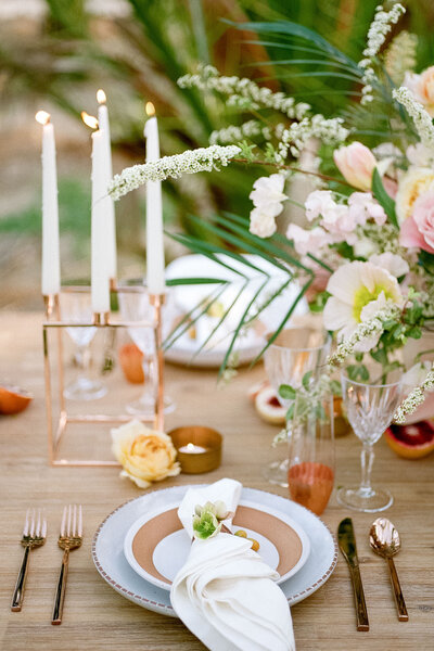 Outdoor wedding reception dinner table setting