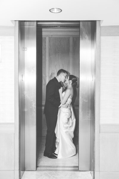 bride-groom-elevator-kissing-florida