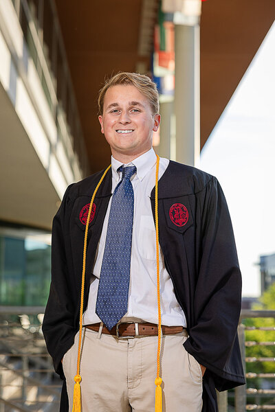 A University of South Carolina student taking his senior portraits on campus