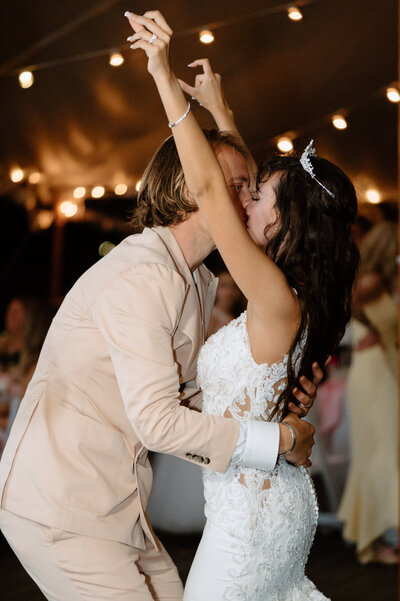 POV of bride and groom looking at bride's father during wedding speeches - by Daniella Diaz Photo