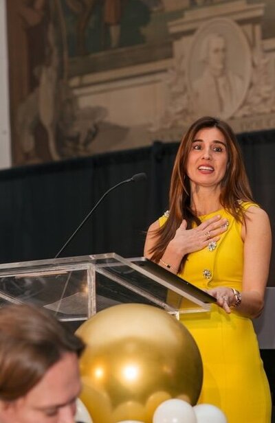 Live auction moment at an NYC charity gala at Edison Ballroom