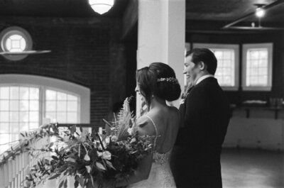 Bride and groom black and white film wedding photo at the evergreen wedding venue portland oregon