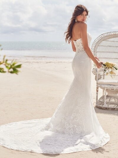 It's a match! Sweet meets sexy in this classic strapless mermaid wedding dress featuring cascades of lace and soft texture. Add the off-the-shoulder sleeves for a dose of modern romance.