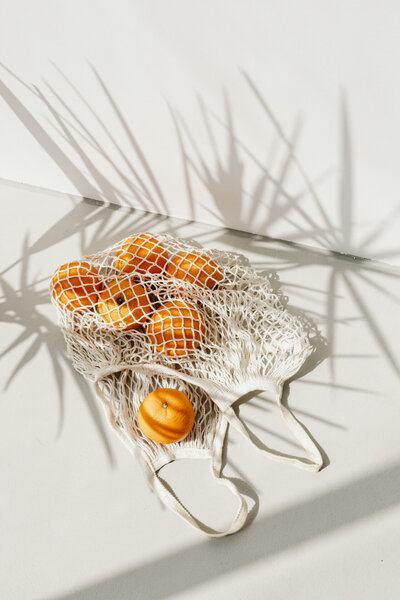 kaboompics_A few oranges in the bag - business card - free mockup photos