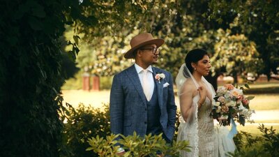 Bride and groom walk up memorial steps at their DC wedding