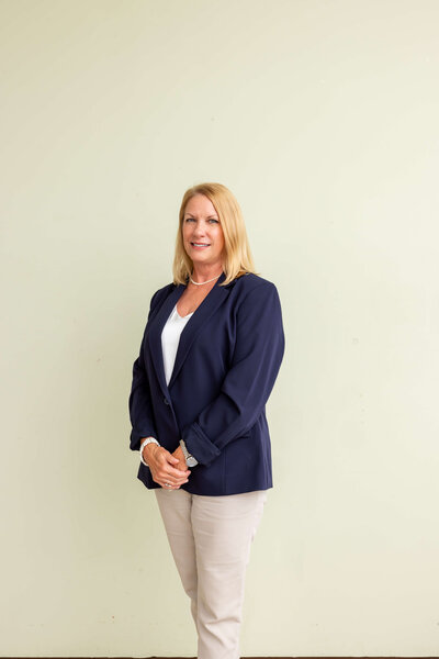 Portrait of Stacy Meza, Vice President of Operations at WLS Interests, known for her expertise in new construction, property operations, tax credit portfolios, and company wide training.