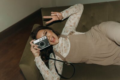 woman holding camera