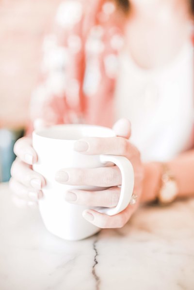 Cup of coffee in hands