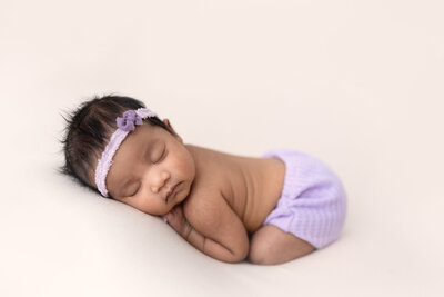 Newborn Baby girl in purple